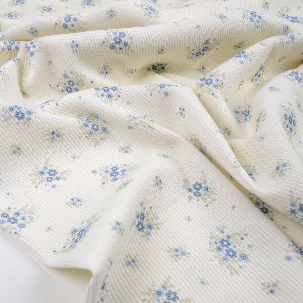 Tygdrömmar Bio Ribjersey blaue Blüten - Würfel & Mütze