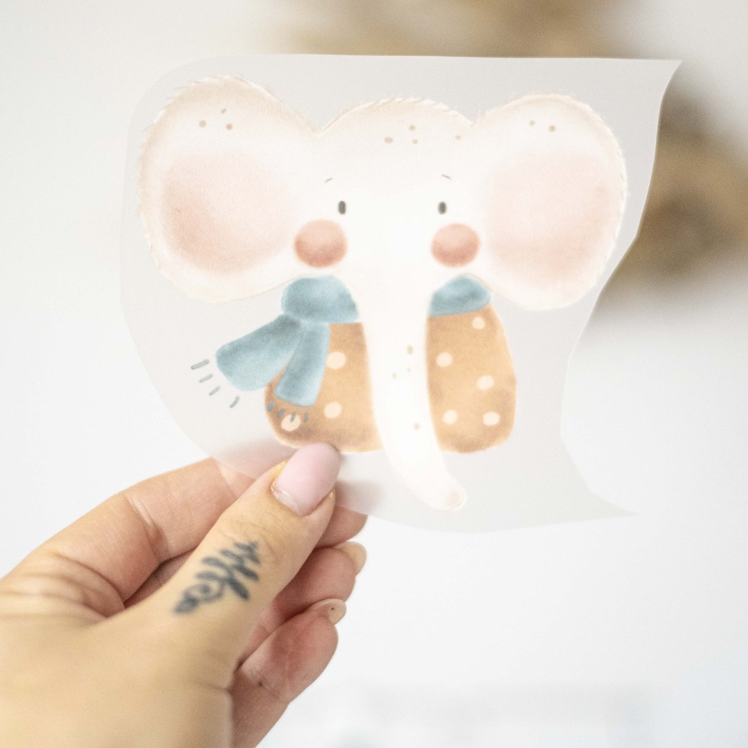 Bügelbild "Elefant im Winterkleid" - Würfel & Mütze